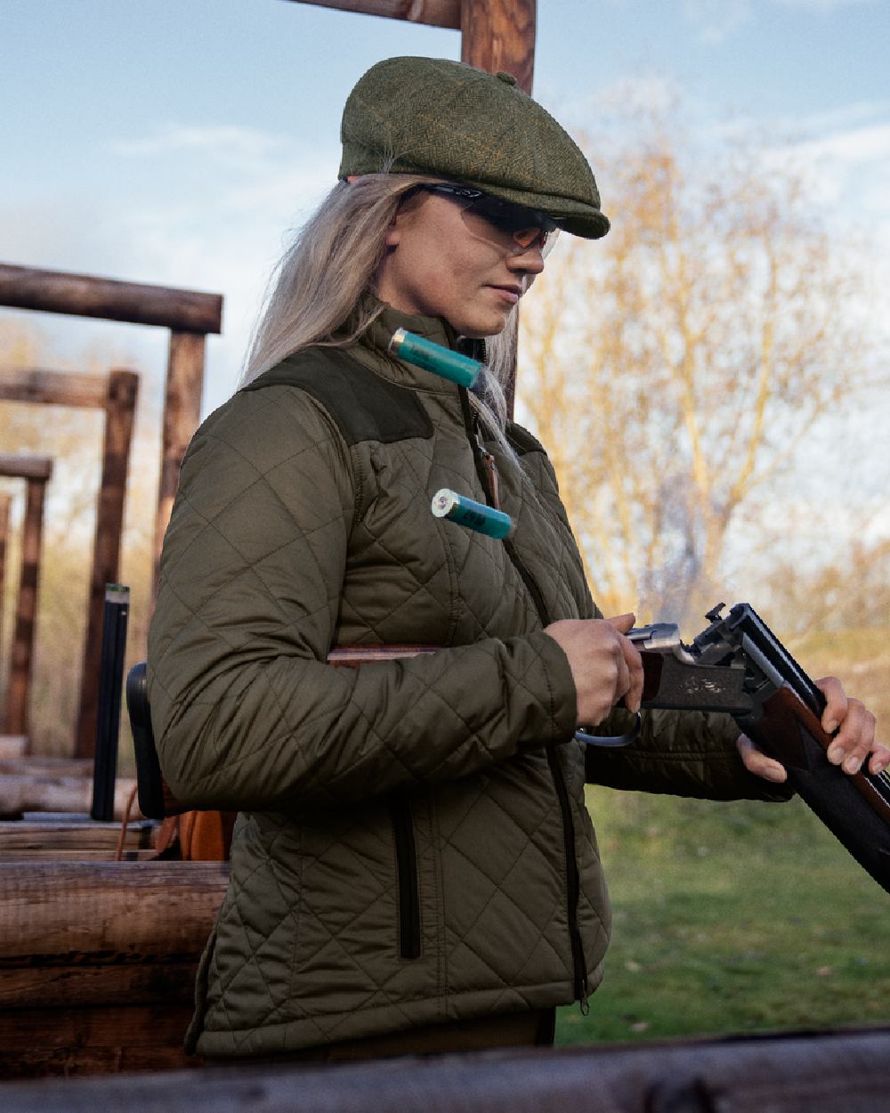 Willow Green Coloured Harkila Womens Ailsa Quilted Jacket on outdoor background 