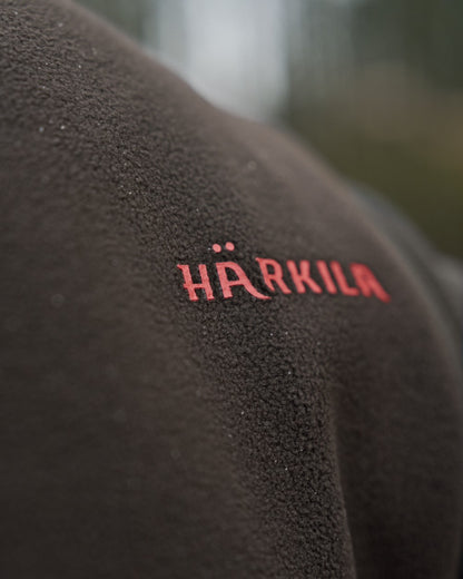 Shadow Brown Coloured Harkila Womens Aspire Fleece Waistcoat on outdoor background 