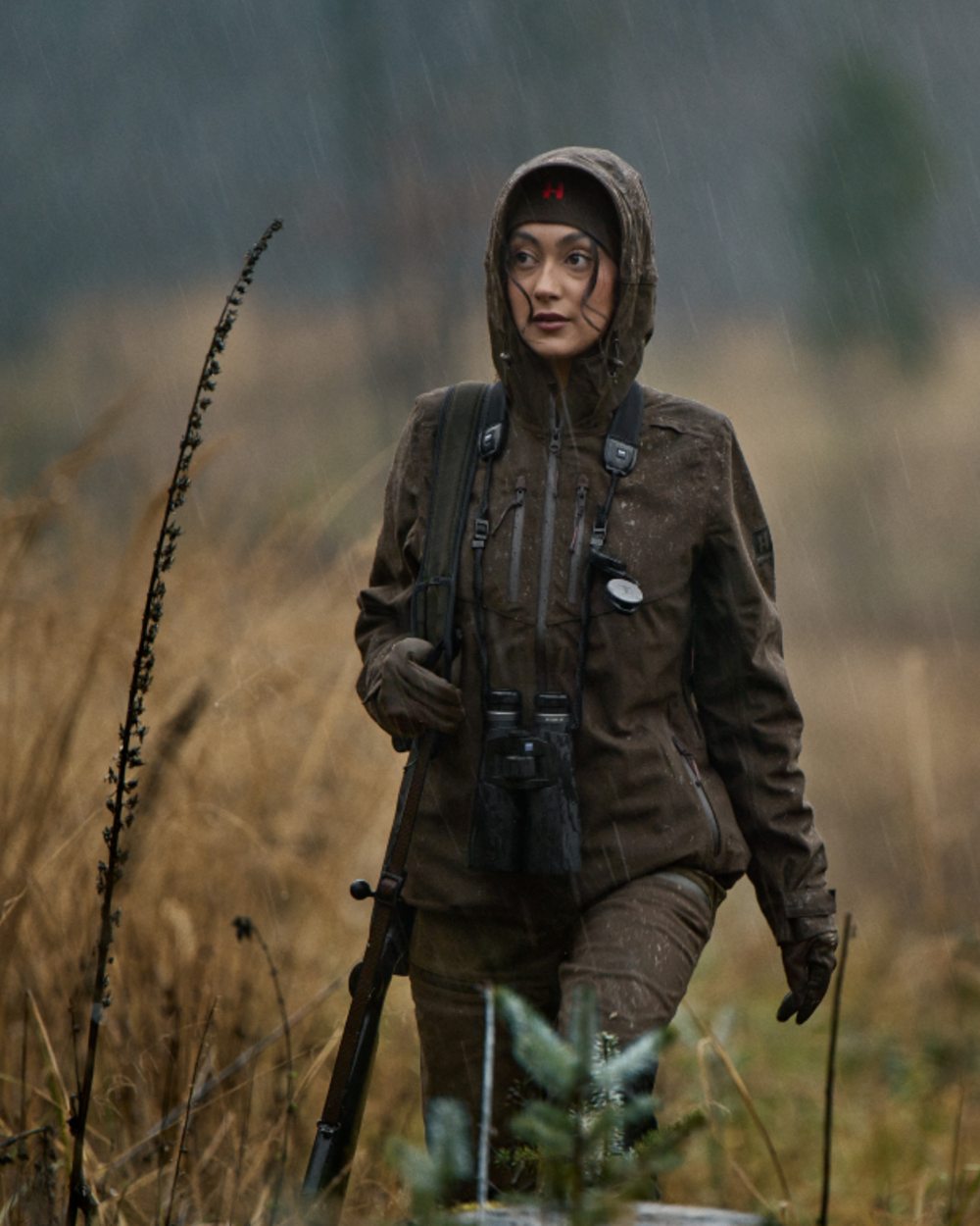 Hunting Green Coloured Harkila Womens Aspire HWS Jacket on outdoor background 