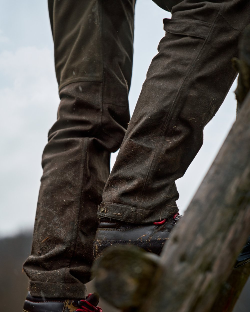 Hunting Green Shadow Brown Coloured Harkila Womens Aspire HWS Trousers on outdoor background 