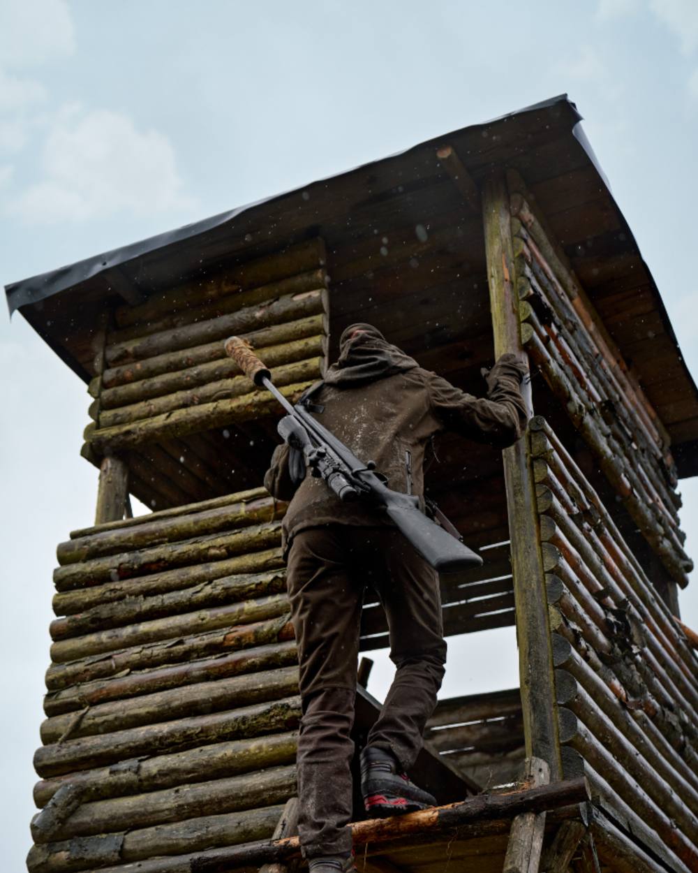 Hunting Green Shadow Brown Coloured Harkila Womens Aspire HWS Trousers on outdoor background 