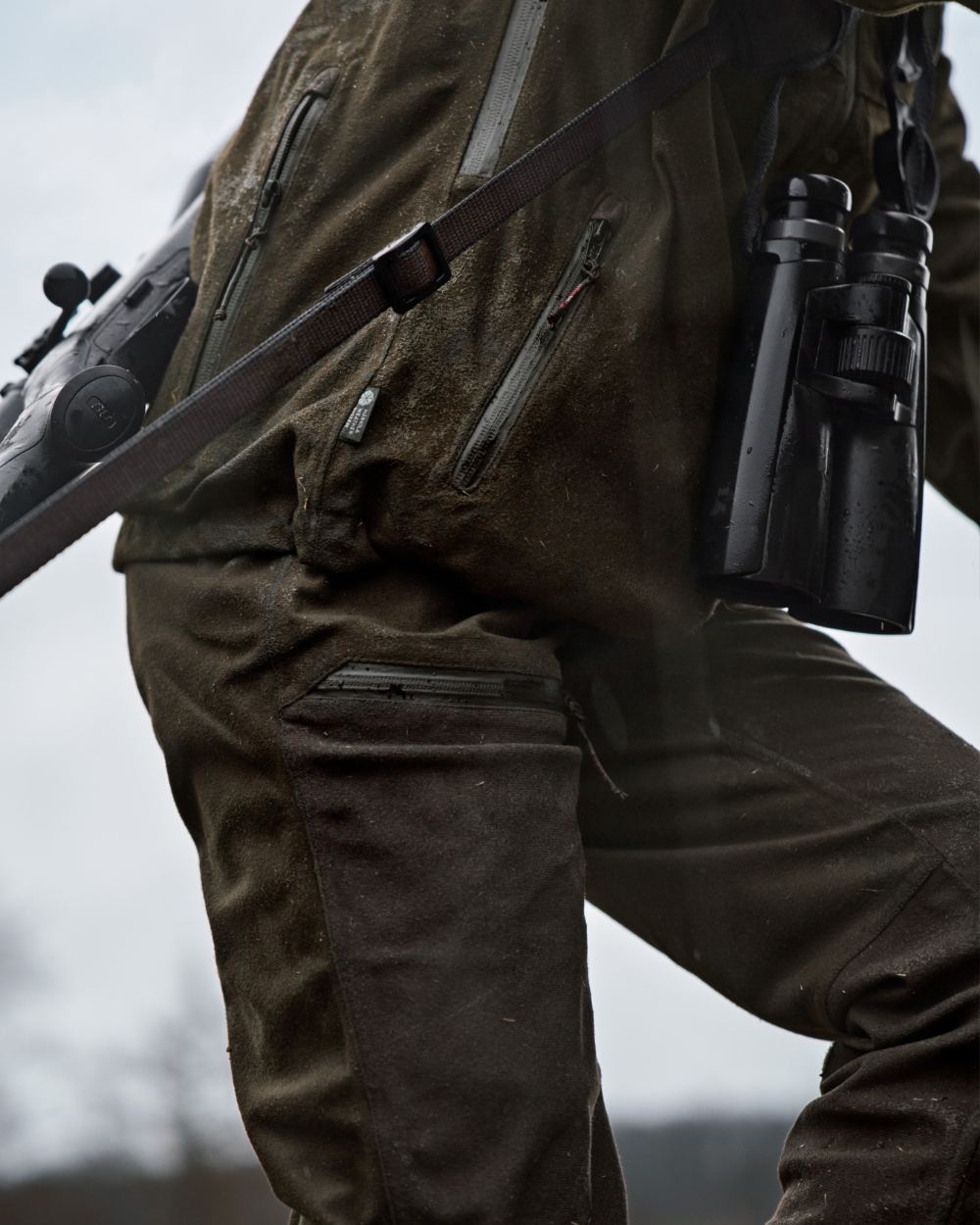 Hunting Green Shadow Brown Coloured Harkila Womens Aspire HWS Trousers on outdoor background 