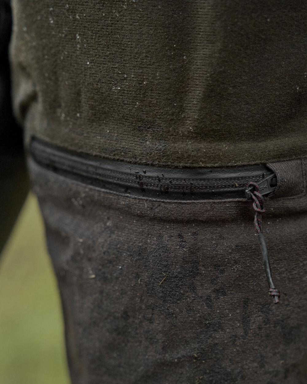 Hunting Green Shadow Brown Coloured Harkila Womens Aspire HWS Trousers on outdoor background 