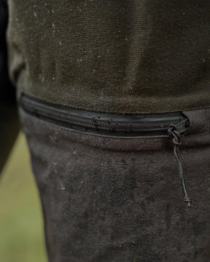 Hunting Green Shadow Brown Coloured Harkila Womens Aspire HWS Trousers on outdoor background 