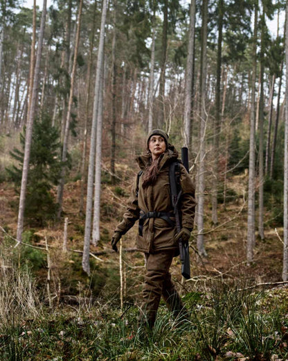Willow Green Coloured Harkila Womens Driven Hunt HWS Insulated Jacket on forest background 