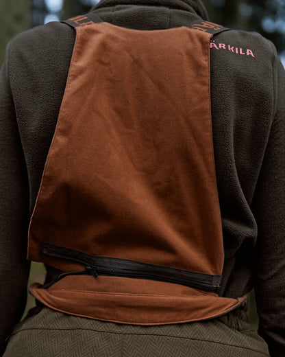 Willow Green Coloured Harkila Womens Driven Hunt HWS Insulated Trousers on forest background 