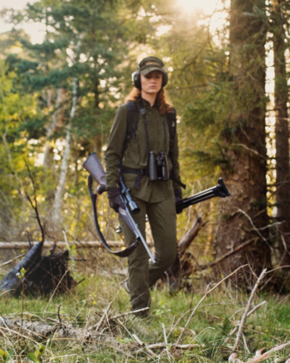 Willow Green Coloured Harkila Womens Herlet Tech Shirt on forest background 