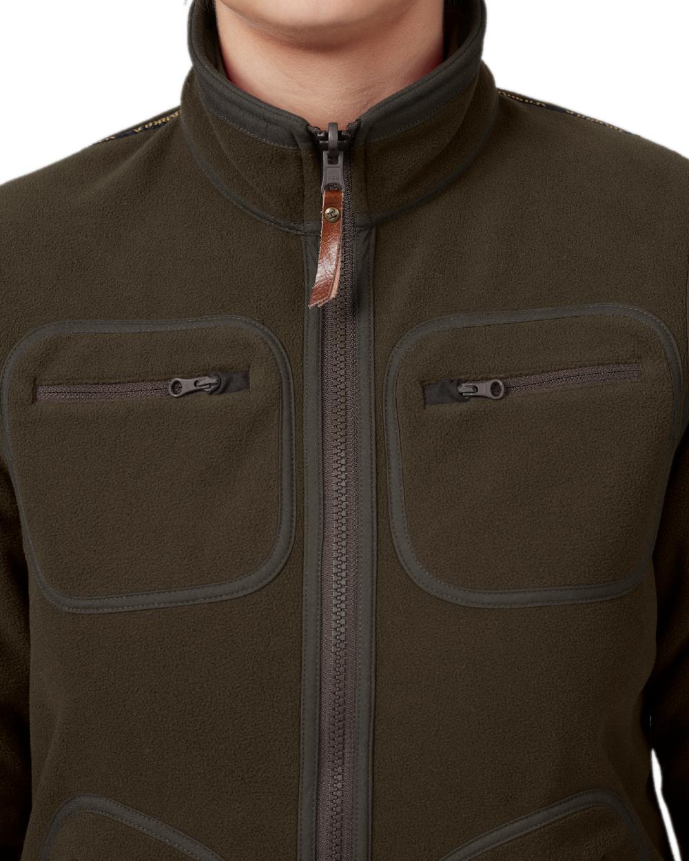 Brown Red Coloured Harkila Womens Kamko Reversible Windstopper Fleece Jacket on white background 