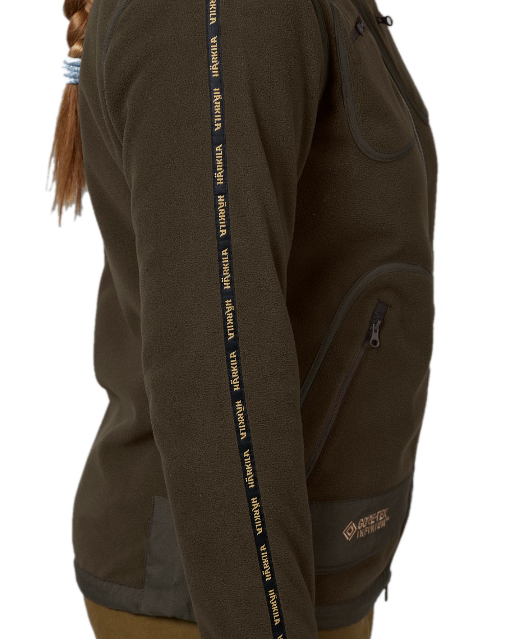 Brown Red Coloured Harkila Womens Kamko Reversible Windstopper Fleece Jacket on white background 