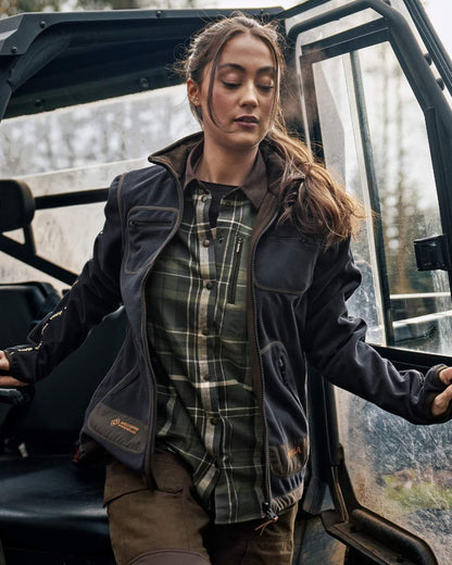 Willow Green Deep Well Purple Coloured Harkila Womens Kamko Reversible Windstopper Fleece Jacket on forest background 