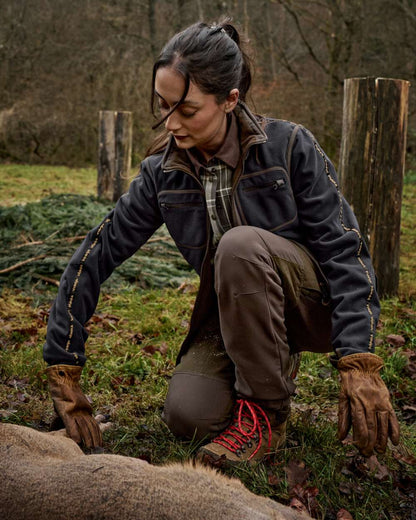 Willow Green Deep Well Purple Coloured Harkila Womens Kamko Reversible Windstopper Fleece Jacket on forest background 