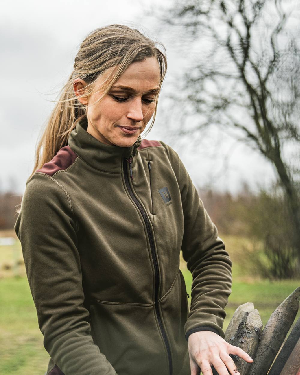 Willow Green Coloured Harkila Womens Oda Fleece Jacket on outdoor background 