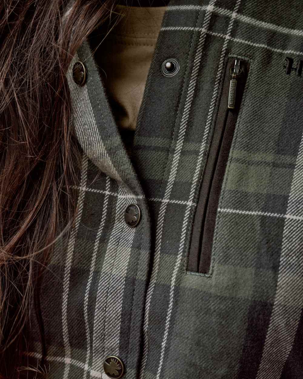 Olive Check Coloured Harkila Womens Pajala Long Sleeve Shirt on outdoor background 