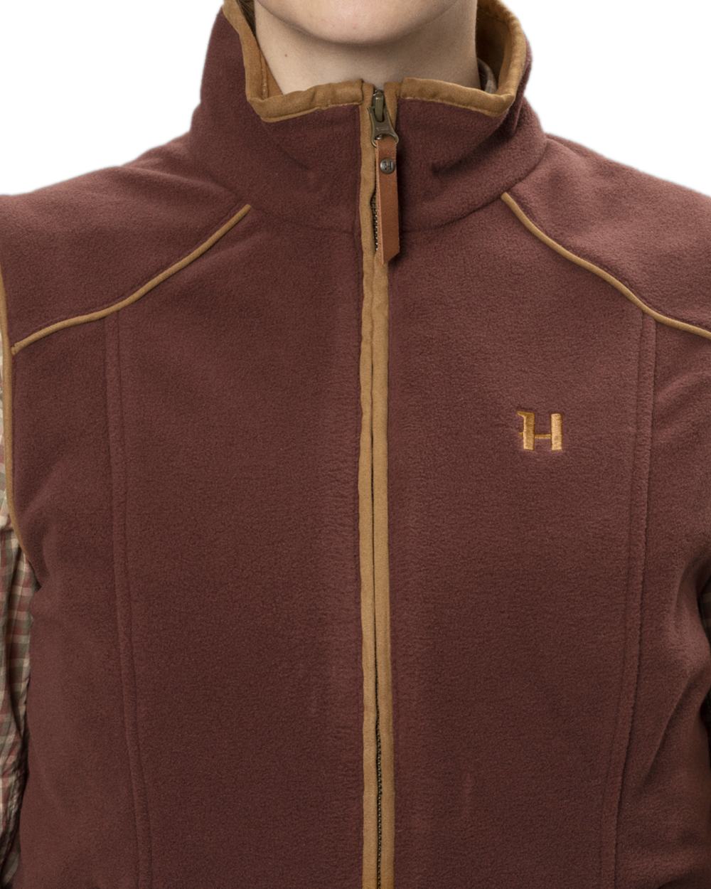 Burgundy Coloured Harkila Womens Sandhem 200 Fleece Waistcoat on white background 
