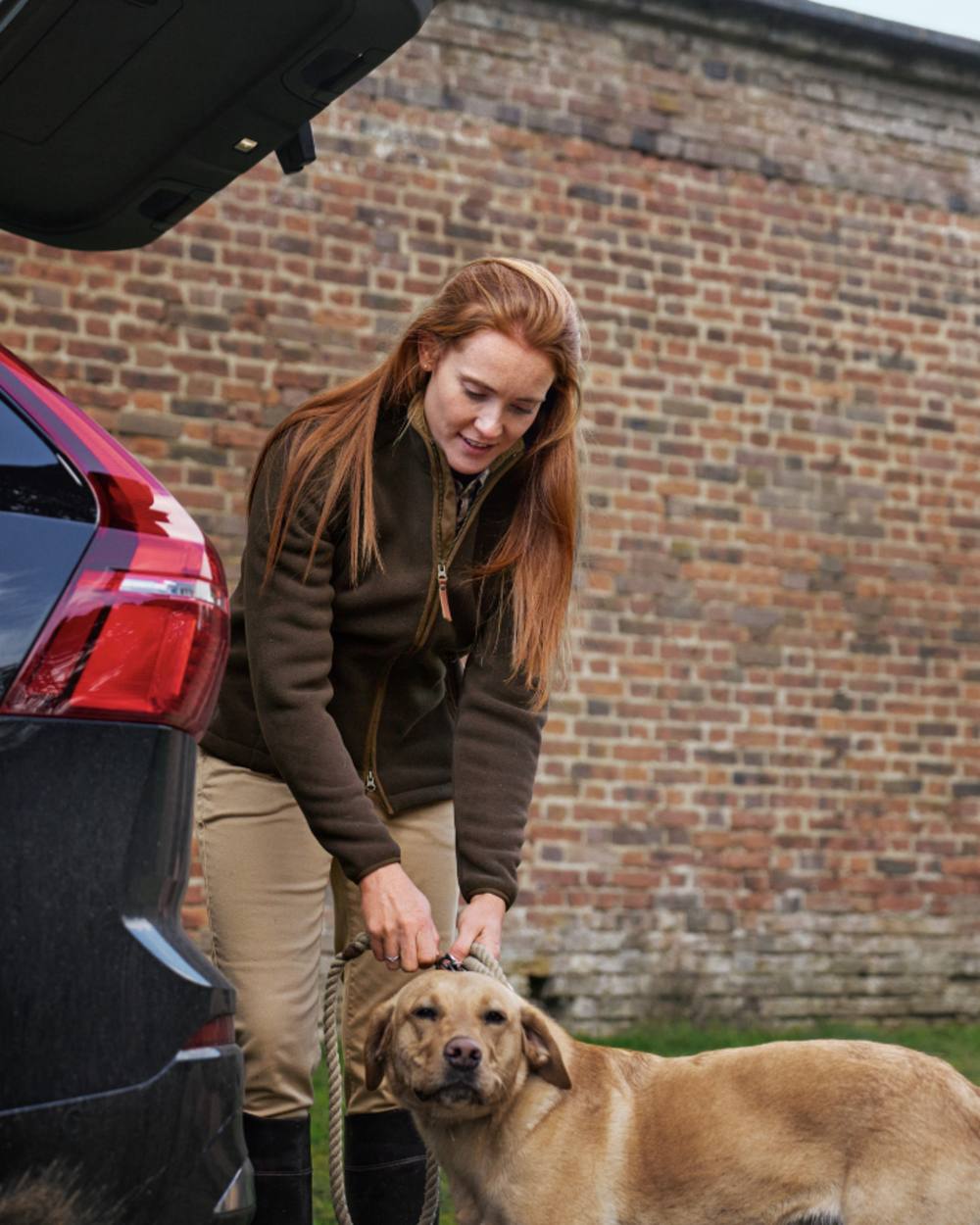 Demitasse Brown Coloured Harkila Womens Sandhem Sherpa Fleece Jacket on outdoor background 