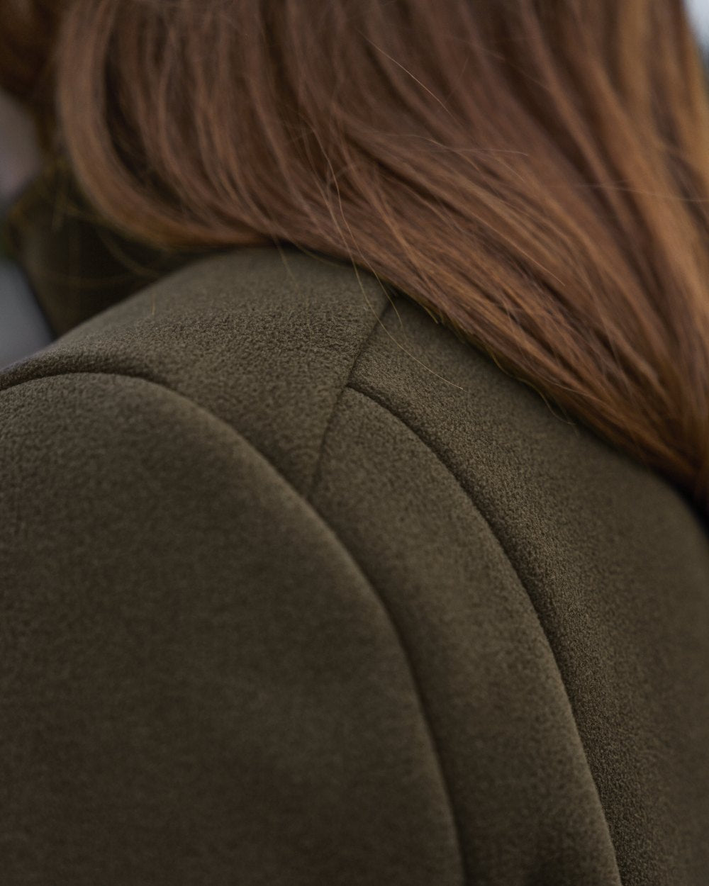 Willow Green Coloured Harkila Womens Sandhem Sherpa Fleece Jacket on outdoor background 