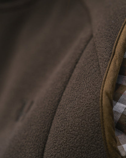 Demitasse Brown Coloured Harkila Womens Sandhem Sherpa Fleece Waistcoat on outdoor background 