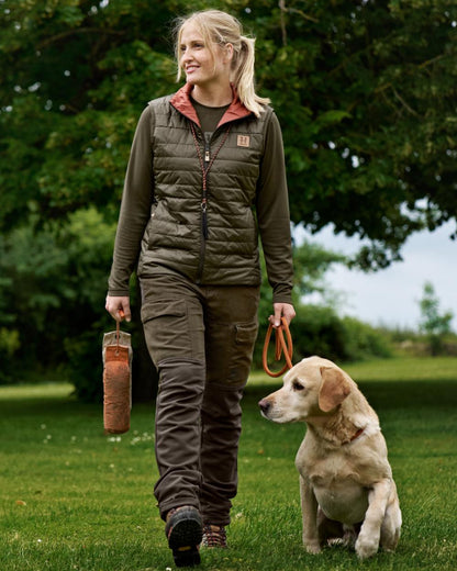 Willow Green Deep Brown coloured Harkila Womens Scandinavian Trousers on forest background 