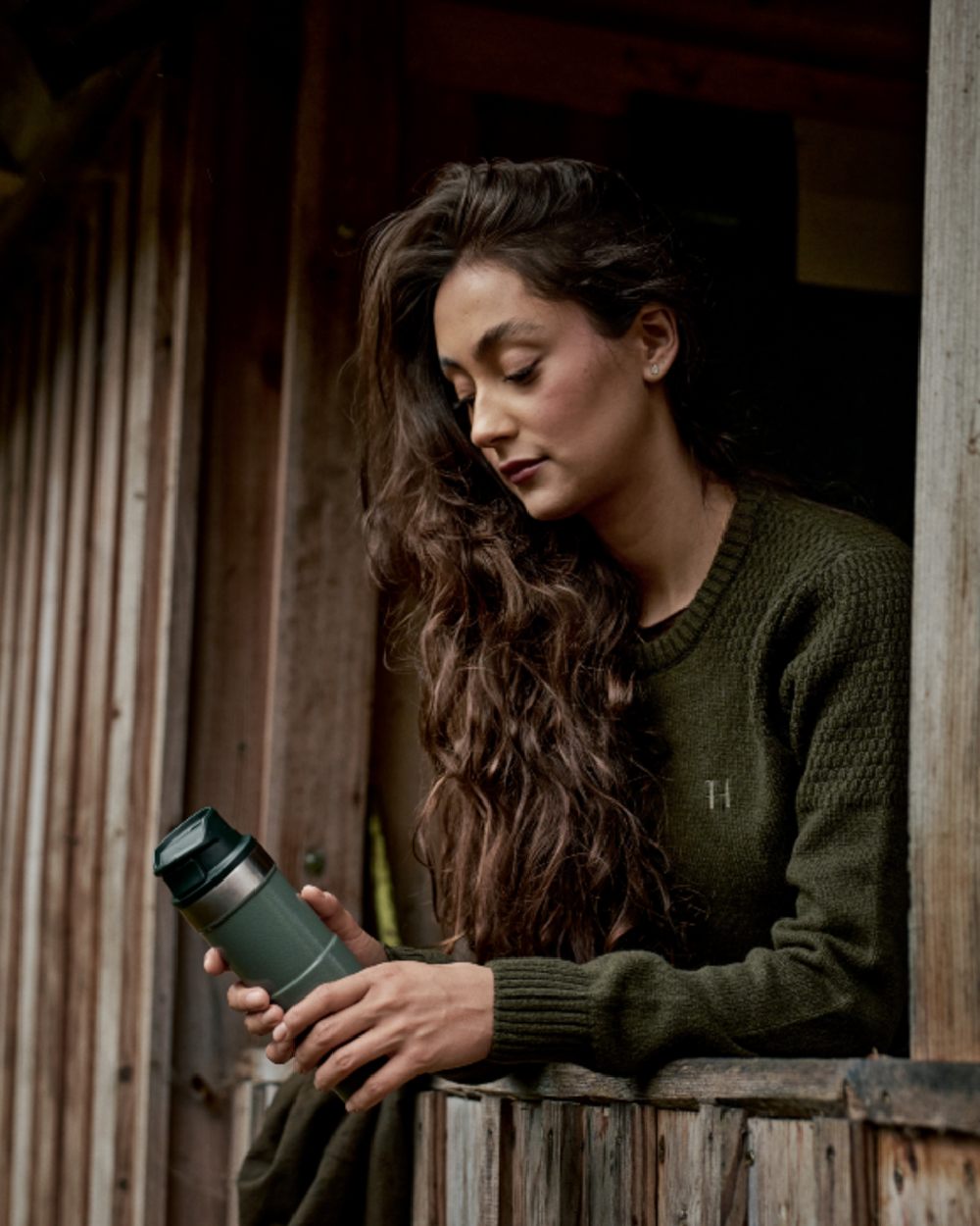 Rosin Coloured Harkila Womens Vinnie Merino Pullover on outdoor background 