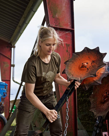 Willow Green Coloured Harkila Womens Wildboar Short Slevee T-Shirt on outdoor background 