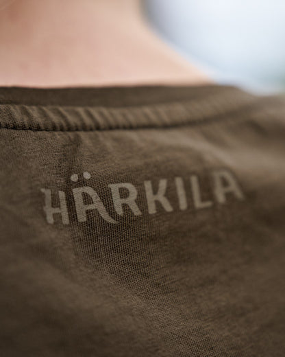 Willow Green Coloured Harkila Womens Wildboar Short Slevee T-Shirt on outdoor background 