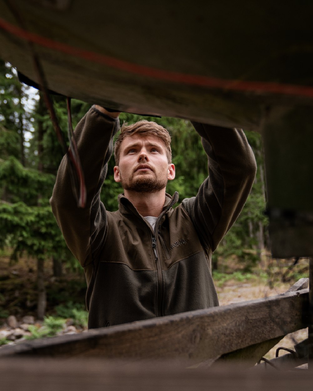 Shadow Brown coloured Harkila Fjell Fleece Jacket worn outdoors 