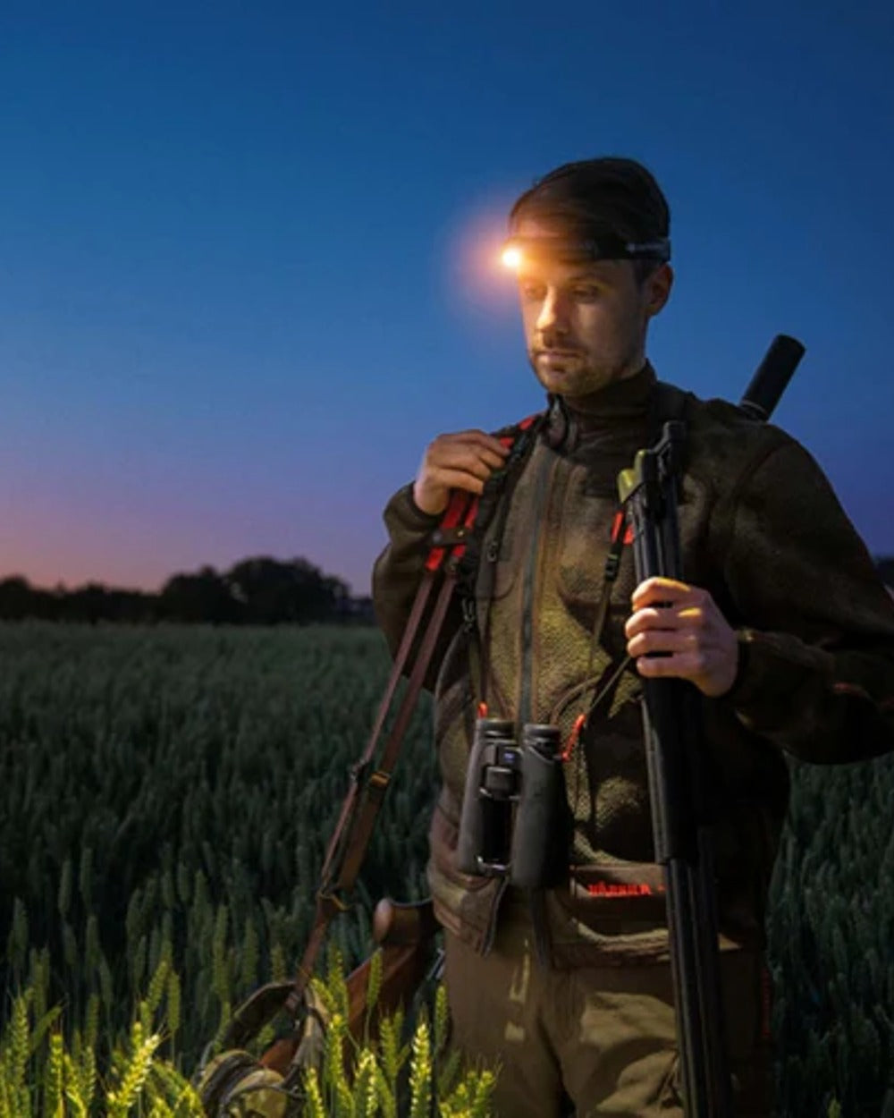 AXIS MSP Limited Edition coloured Harkila Kamko Pro Edition Reversible Jacket on field background at night