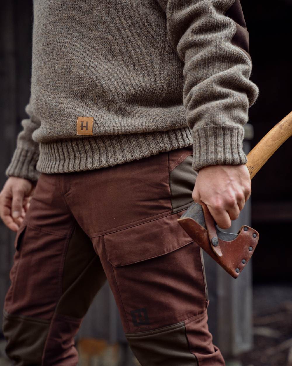 Bloodstone Red/Shadow Brown coloured Harkila Scandinavian Trousers worn for woodcutting 