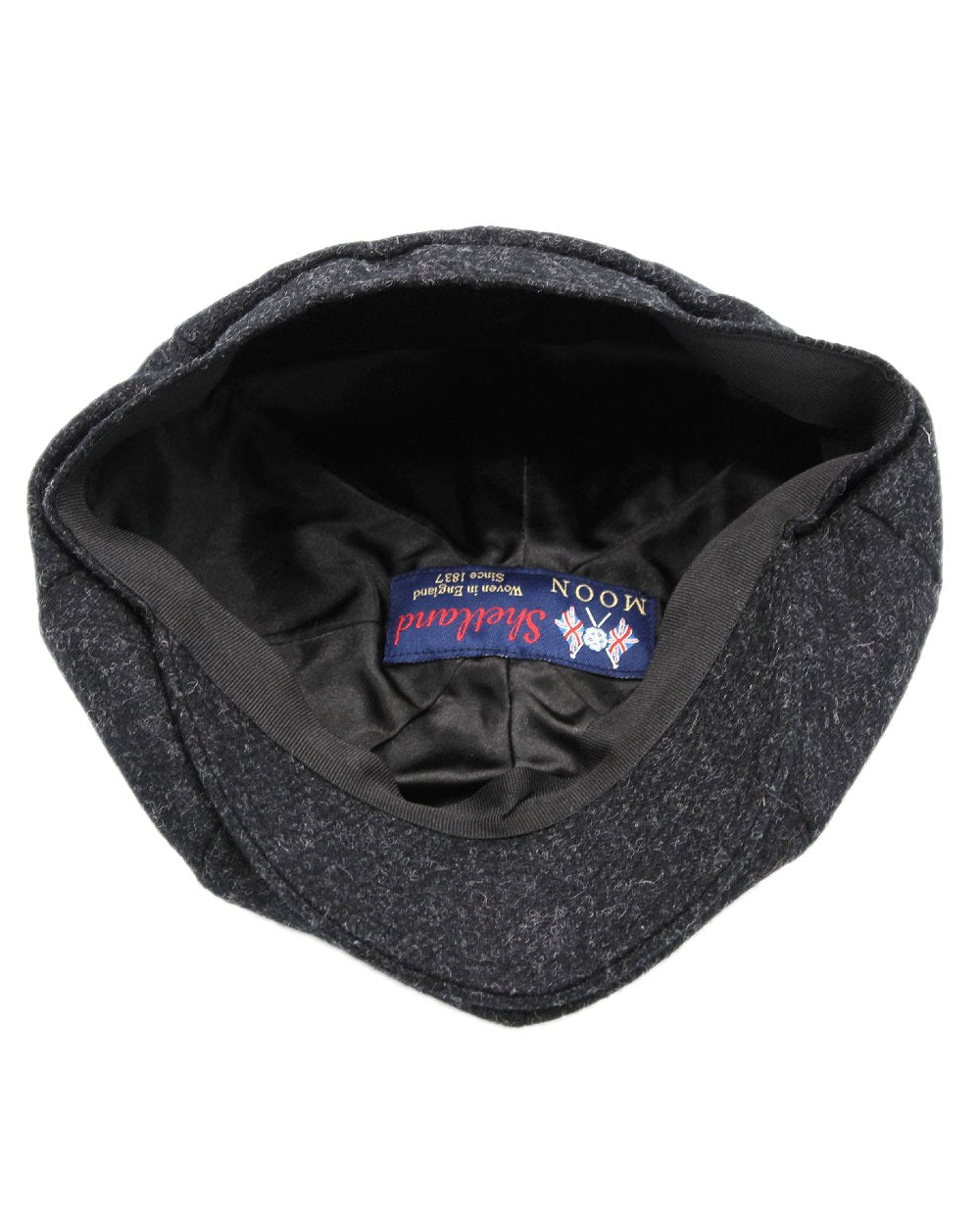 Black Coloured Heather Archie Twill 8-Piece Tweed Cap on white background 