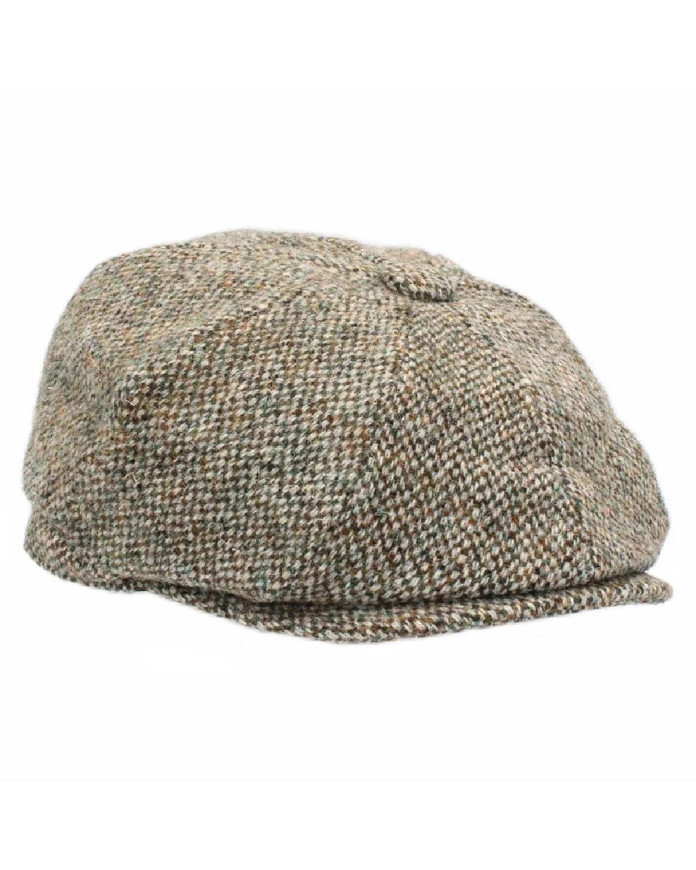 Pebble coloured Heather Brodick Harris Tweed 8-Piece Cap on white background 