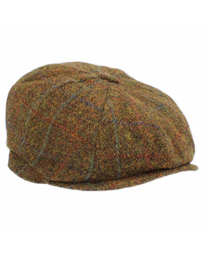 Rust coloured Heather Brodick Harris Tweed 8-Piece Cap on white background 