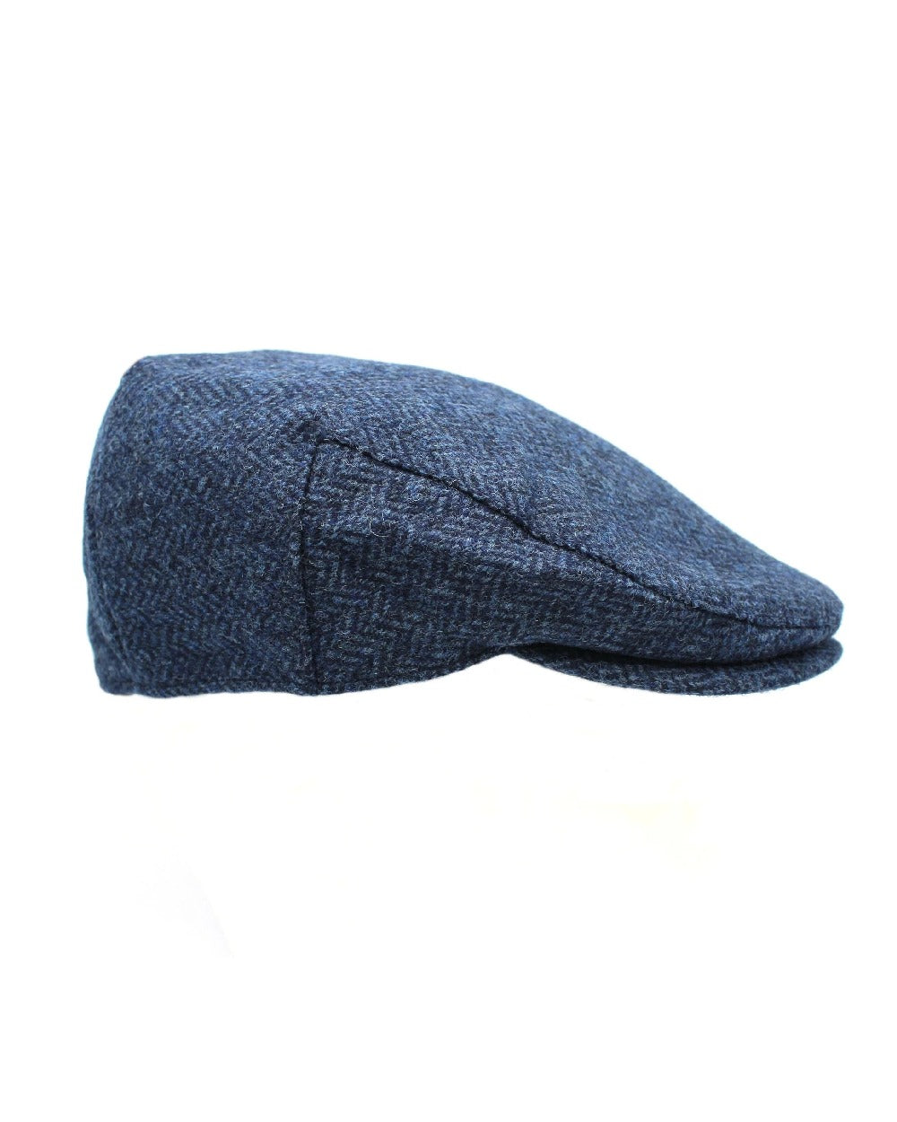 Harbour coloured Heather Chapman Shetland Wool Tweed Flat Capon white background 