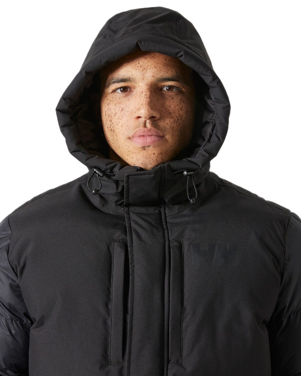 Black Coloured Helly Hansen Active Puffy Long Jacket on white background 