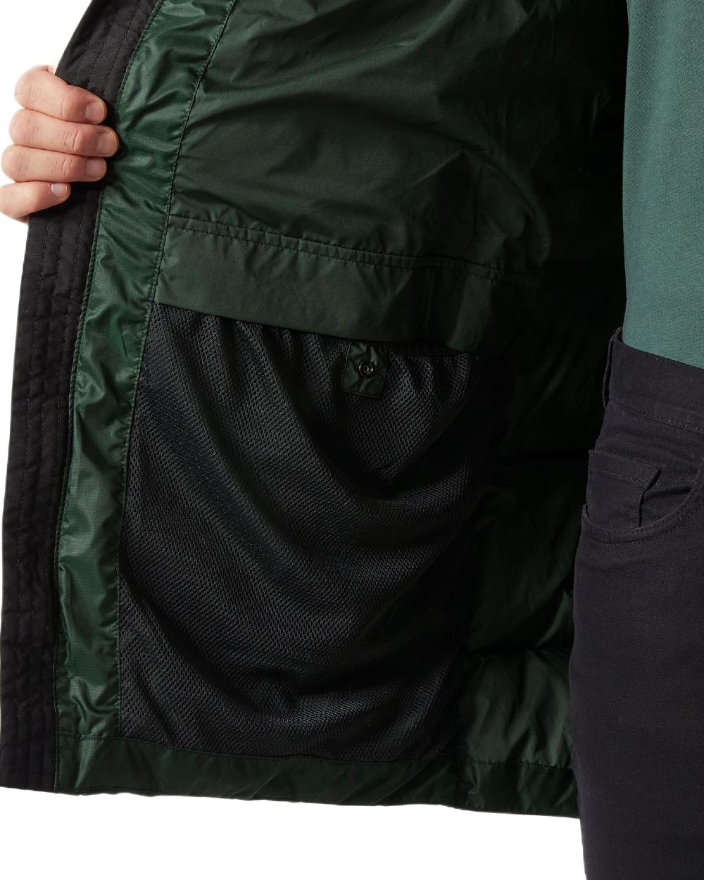 Dark Jungle Coloured Helly Hansen Active Puffy Long Jacket on white background 