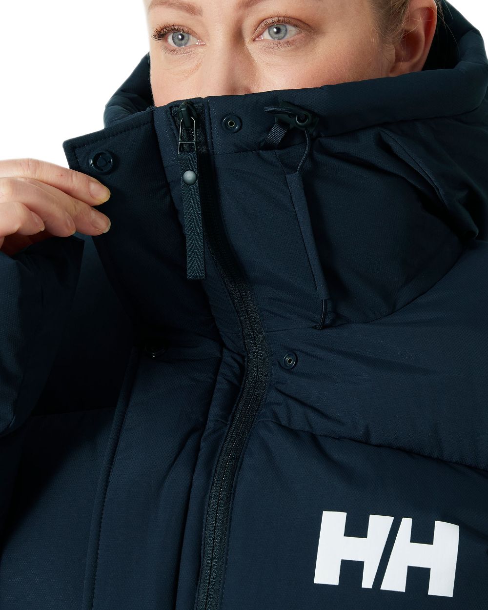 Navy Coloured Helly Hansen Adore Ladies Puffy Parka on white background 