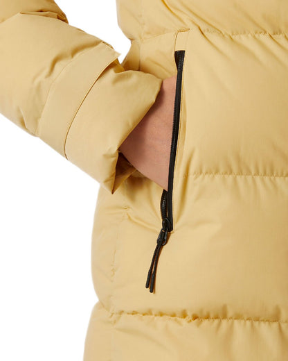Sand Coloured Helly Hansen Adore Ladies Puffy Parka on white background 