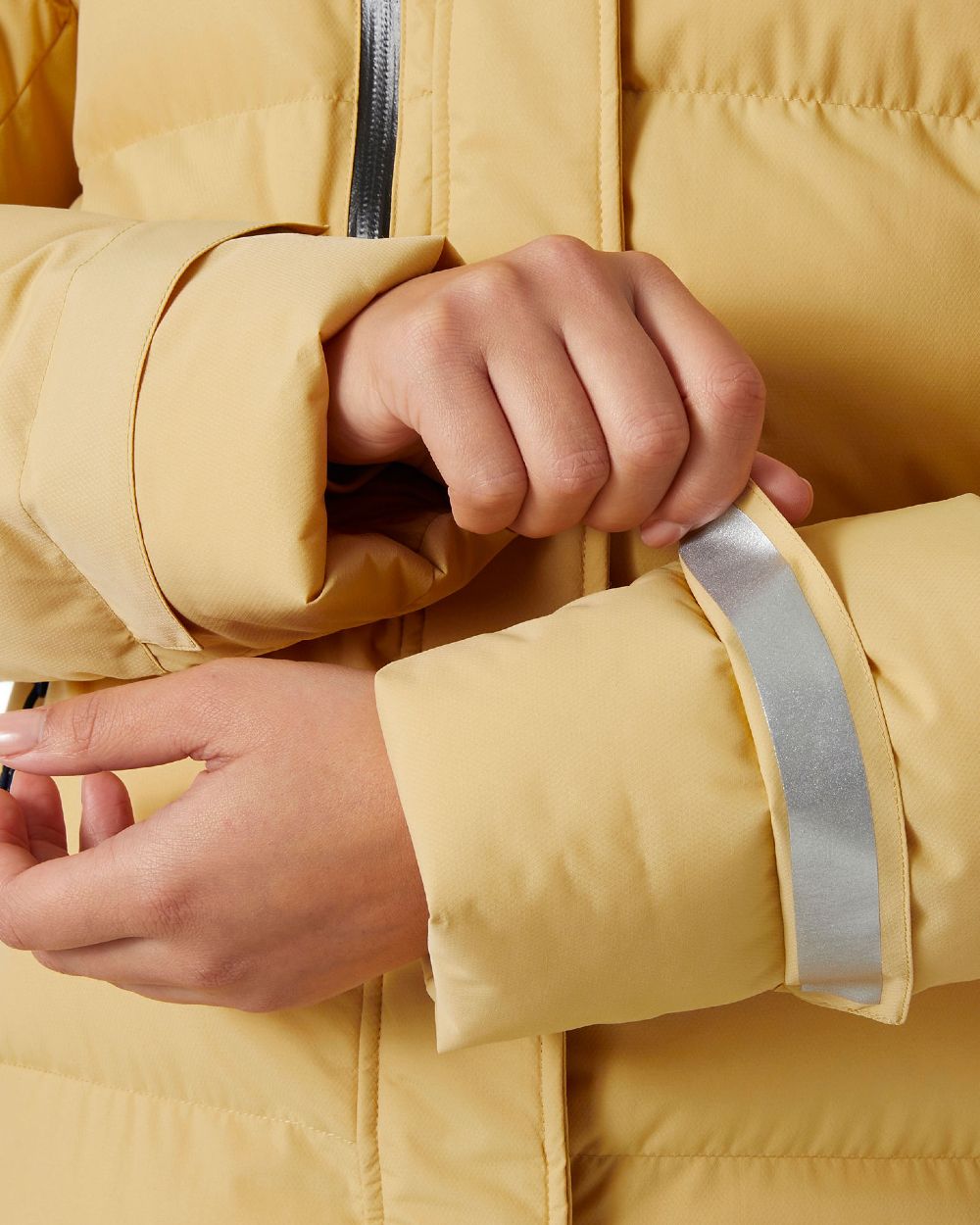 Sand Coloured Helly Hansen Adore Ladies Puffy Parka on white background 