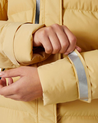 Sand Coloured Helly Hansen Adore Ladies Puffy Parka on white background 