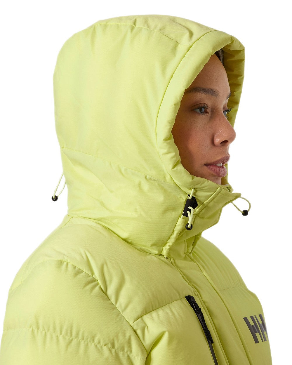 Sunny Lime Coloured Helly Hansen Adore Ladies Puffy Parka on white background 