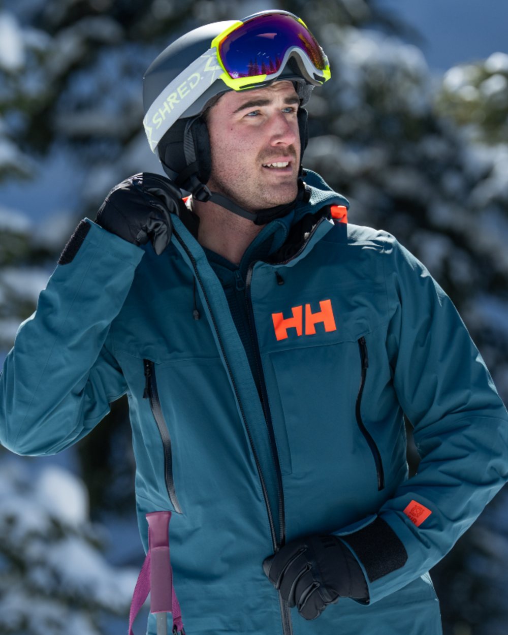 Black Coloured Helly Hansen All Mountain Gloves on snow background 