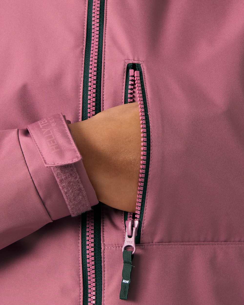 Wildberry coloured Helly Hansen Belfast Long Rain Jacket on white background 
