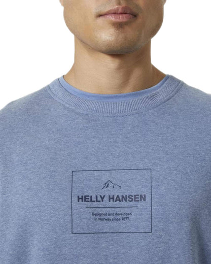 Azurite Melange Coloured Helly Hansen F2F Organic Cotton Sweater on white background 