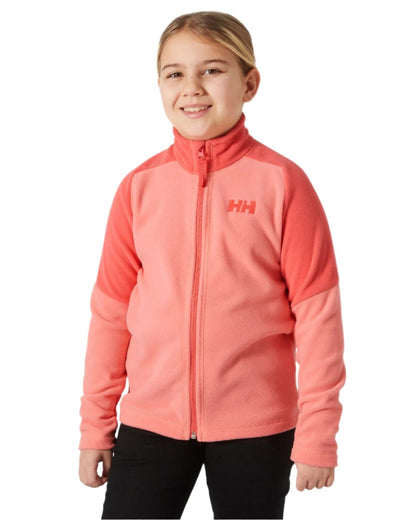 Coral Almond Coloured Helly Hansen Juniors Daybreaker 2.0 Jacket on white background 