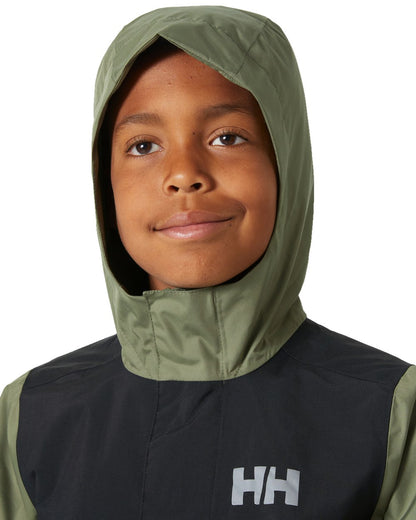 Lav Green Coloured Helly Hansen Juniors Vancouver Rain Jacket on white background 