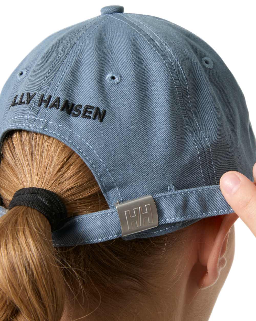 Washed Navy Coloured Helly Hansen Logo Cap on White Background

