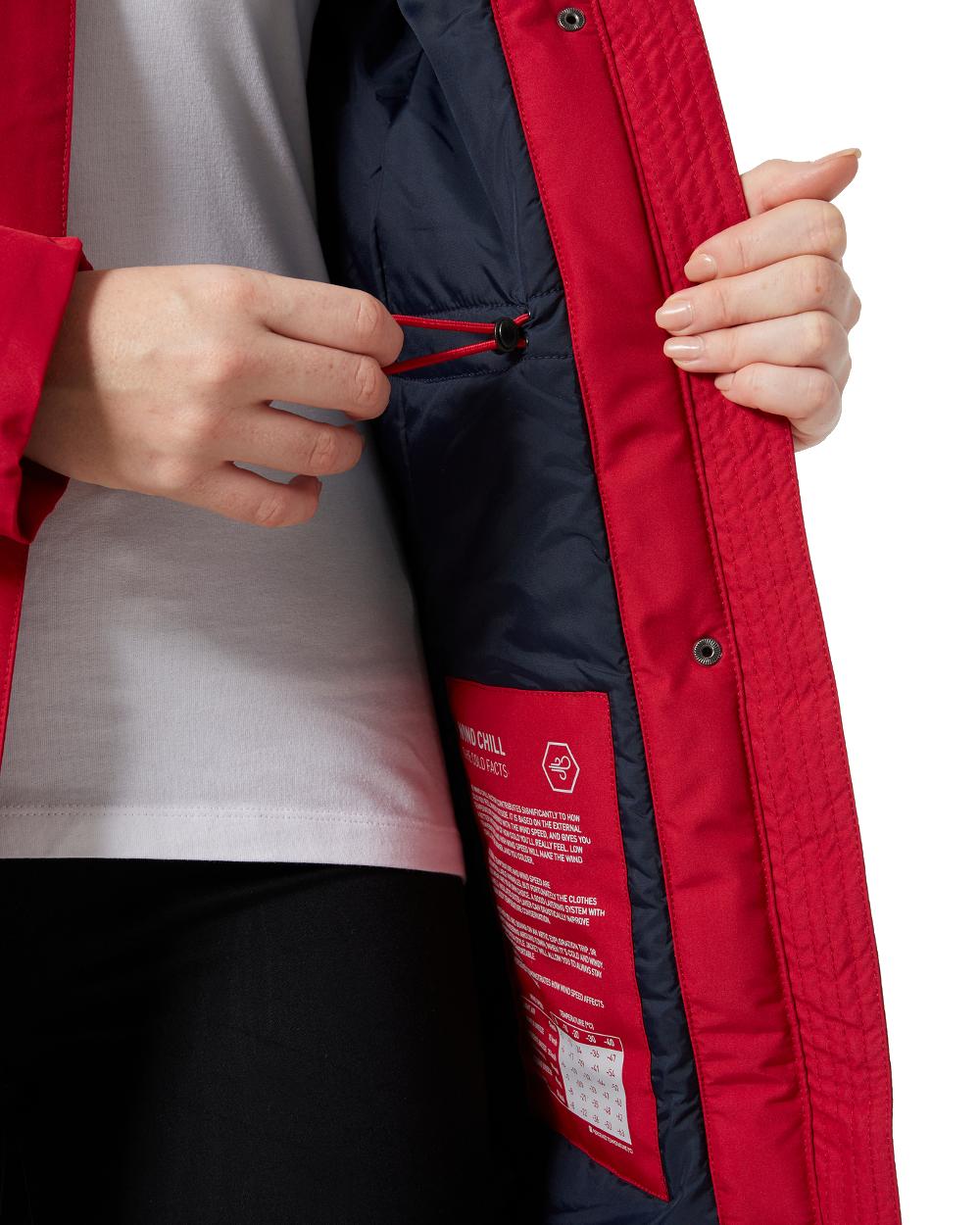 Red coloured Helly Hansen Mayen Ladies Parka on white background 