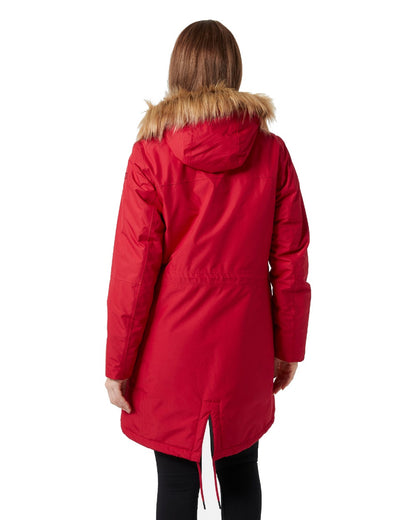 Red coloured Helly Hansen Mayen Ladies Parka on white background 