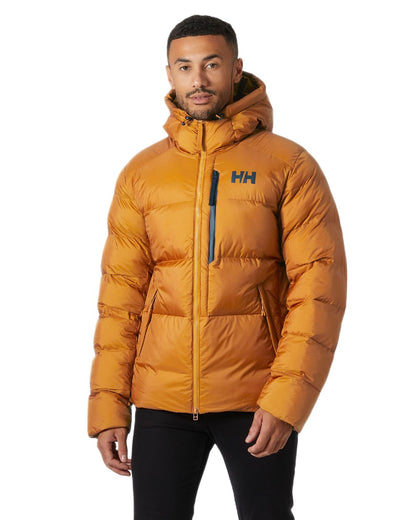 Mustard Coloured Helly Hansen Mens Active Winter Parka on white background 