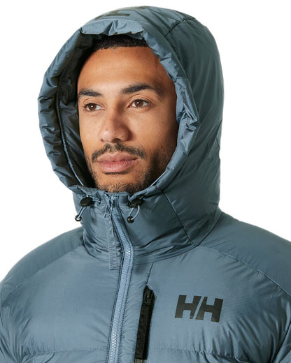 Washed Navy Coloured Helly Hansen Mens Active Winter Parka on white background 