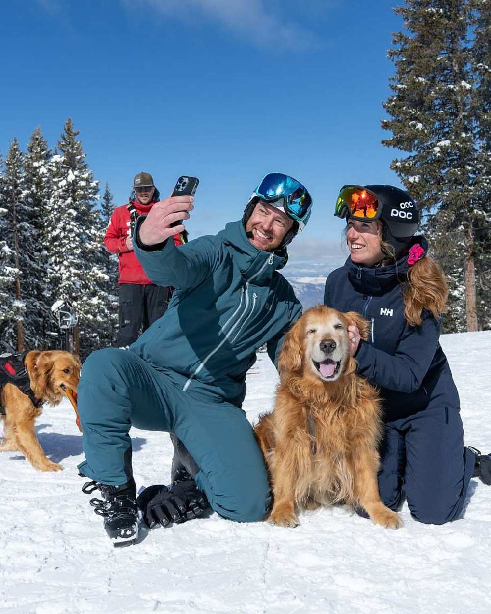 Dark Creek Coloured Helly Hansen Mens Alpha Lifaloft Insulated Ski Jacket on snow background 